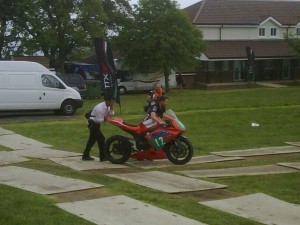 Team Agni Rolls into pits after posting fastest TTXGP practice lap.